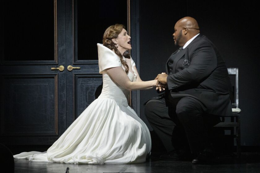 LOS ANGELES, CA - OCTOBER 13: Sara Jakubiak as "Elisabeth" and Issachah Savage as "Tannhauser" perform during a dress rehearsal of Los Angeles Opera's "Tannhauser" at the Dorothy Chandler Pavilion on Wednesday, Oct. 13, 2021 in Los Angeles, CA. (Myung J. Chun / Los Angeles Times)