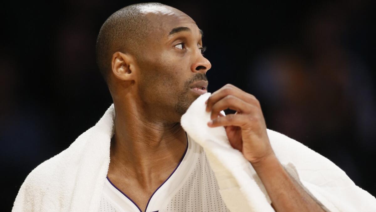 Lakers star Kobe Bryant looks on during a loss to the New Orleans Pelicans on Sunday.
