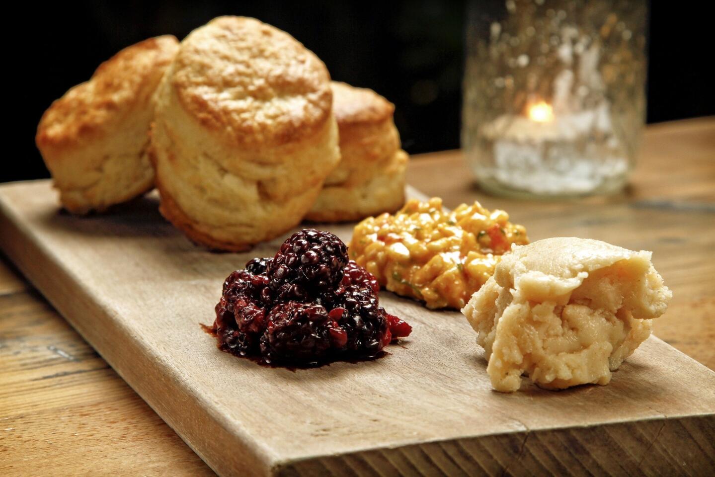 Butter biscuits served with mashed blackberries, pimento cheese spread and honey butter.