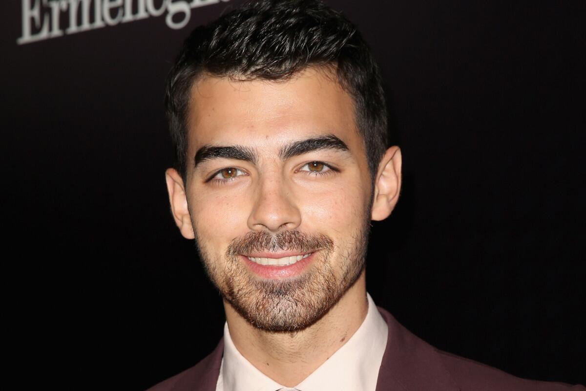 Joe Jonas tells New York magazine that when the show "Jonas" was done, he cut his hair and grew as much of a beard as he could.