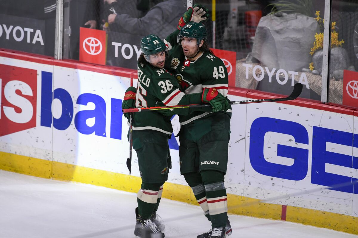 The Wild's Victor Rask, right, celebrates with Mats Zuccarello after Rask scored the overtime winner.