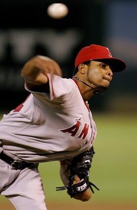 Angels pitcher Ervin Santana makes a pitch against the A's.