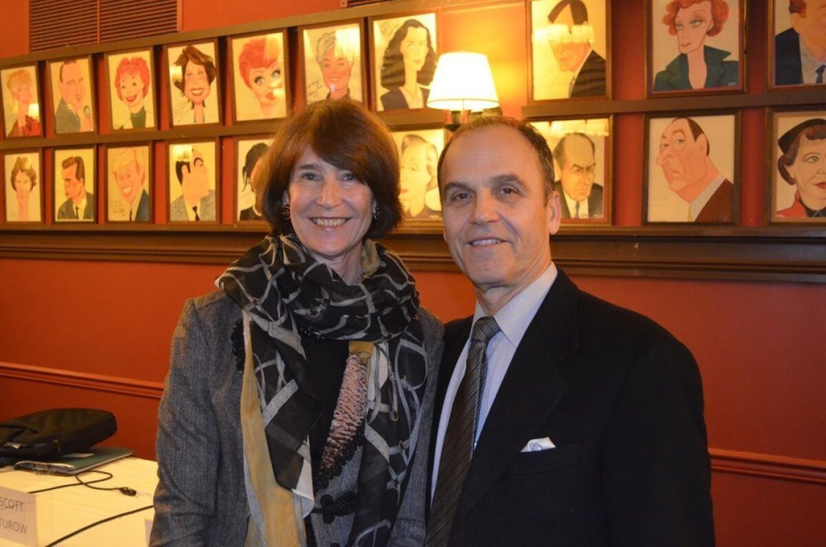 Roxana Robinson, incoming president of the Authors Guild, with its outgoing president Scott Turow.