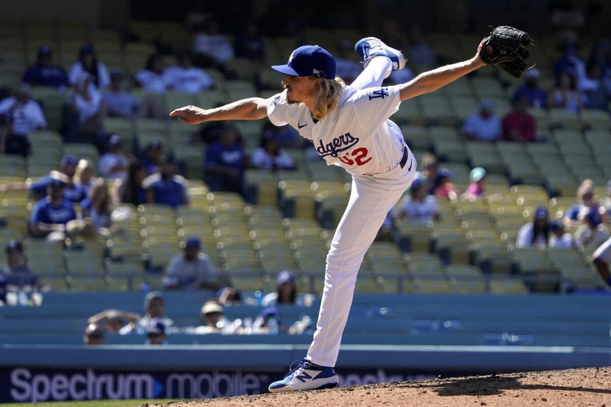 Dodgers starting pitcher Phil Bickford delivers during a win over the Texas Rangers on Sunday.