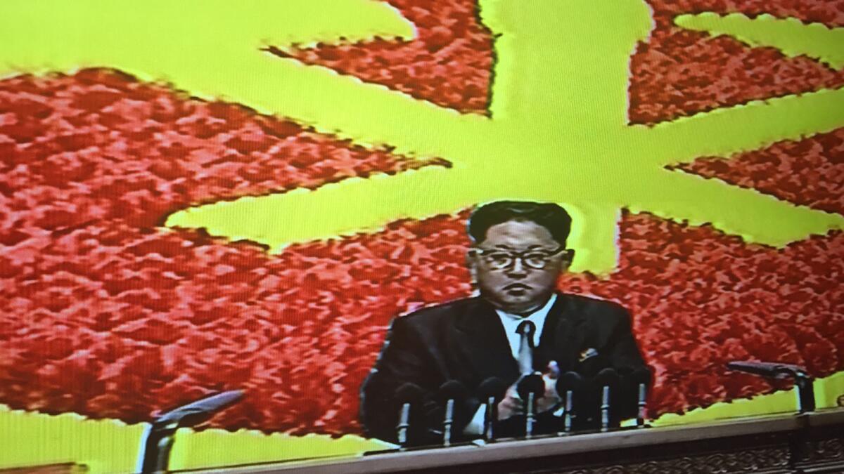 In an image taken from TV, Kim Jong Un addresses the National Party Congress in Pyongyang.