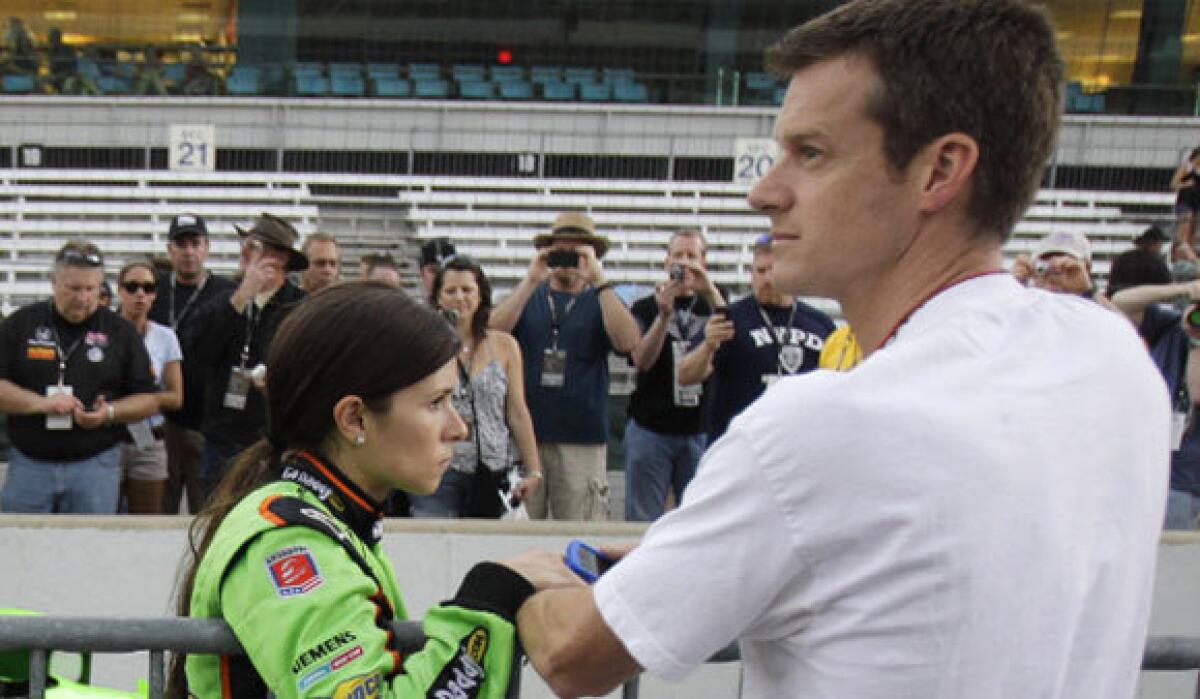 Danica Patrick and Paul Hospenthal, shown in 2011, are divorcing after seven years of marriage.