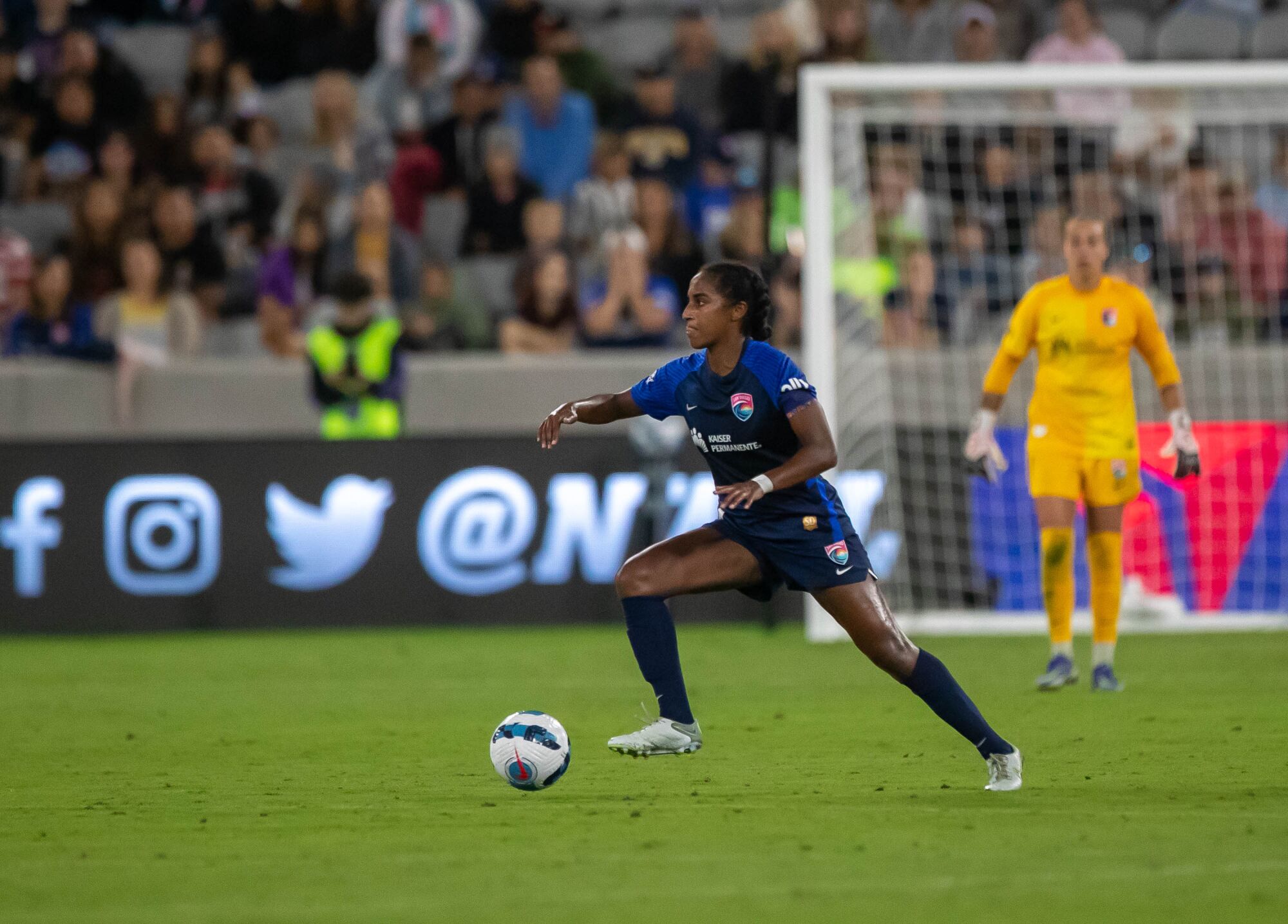 Wave FC defender Naomi Girma controls the ball in a game against the N.C. Courage last season.