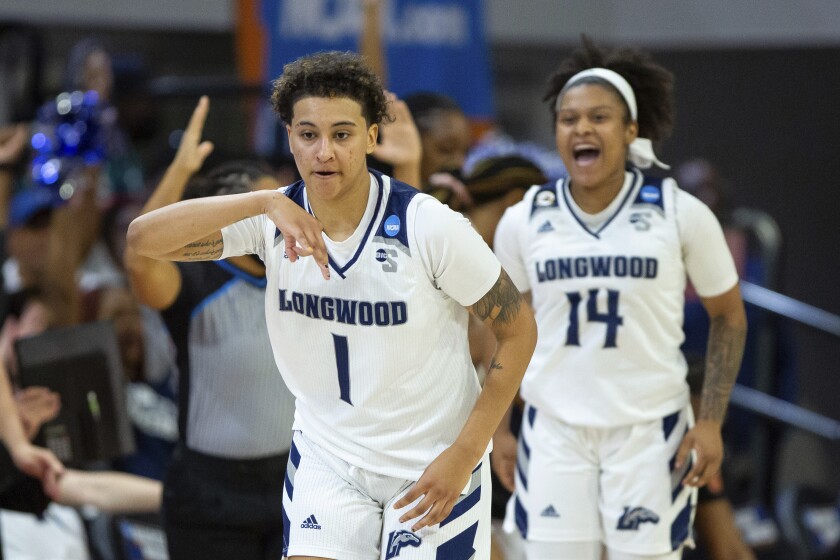 Longwood's Kyla McMakin (1) celebrates after hitting a 3-point basket during the first half of an NCAA college basketball game against Mount St. Mary's in Raleigh, N.C., Thursday, March 17, 2022. (AP Photo/Ben McKeown)