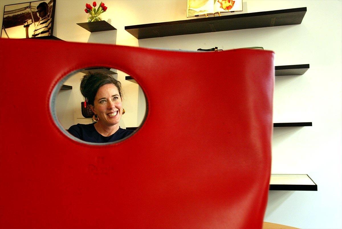Kate Spade launched her handbag line in 1993. Here she is shown in 2002 in a New York showroom.