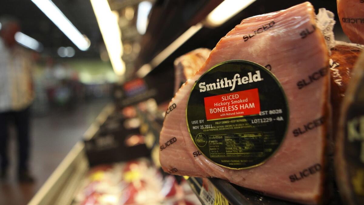 U.S. pork producer Smithfield is owned by the Chinese conglomerate WH Group. Above, a Smithfield ham at a grocery store.