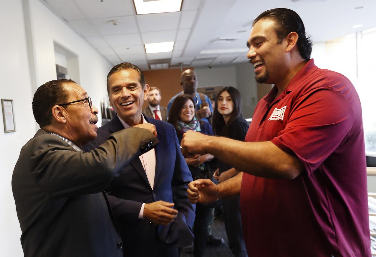 Los Angeles City Council President Herb Wesson, left, toured Homeboy Industries in downtown Los Angeles with Antonio Villaraigosa, center.