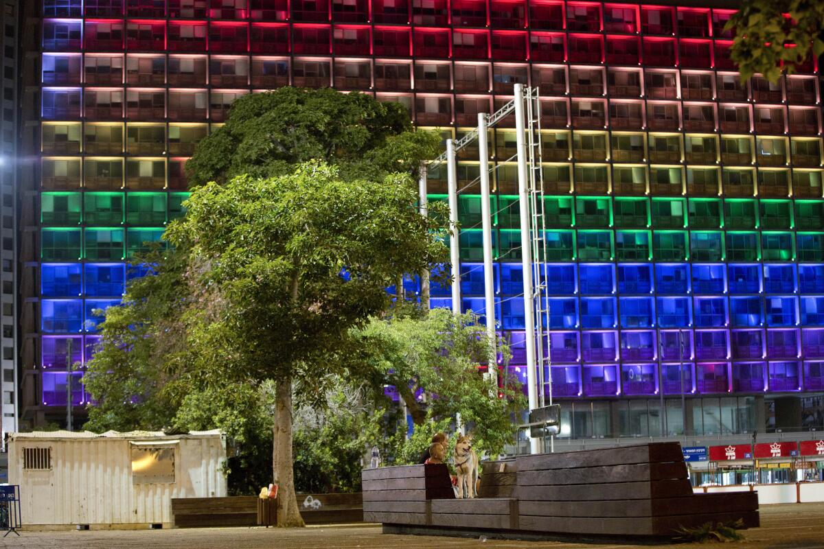 City Hall in Tel Aviv, Israel, is lit up in solidarity with Orlando's shooting victims.