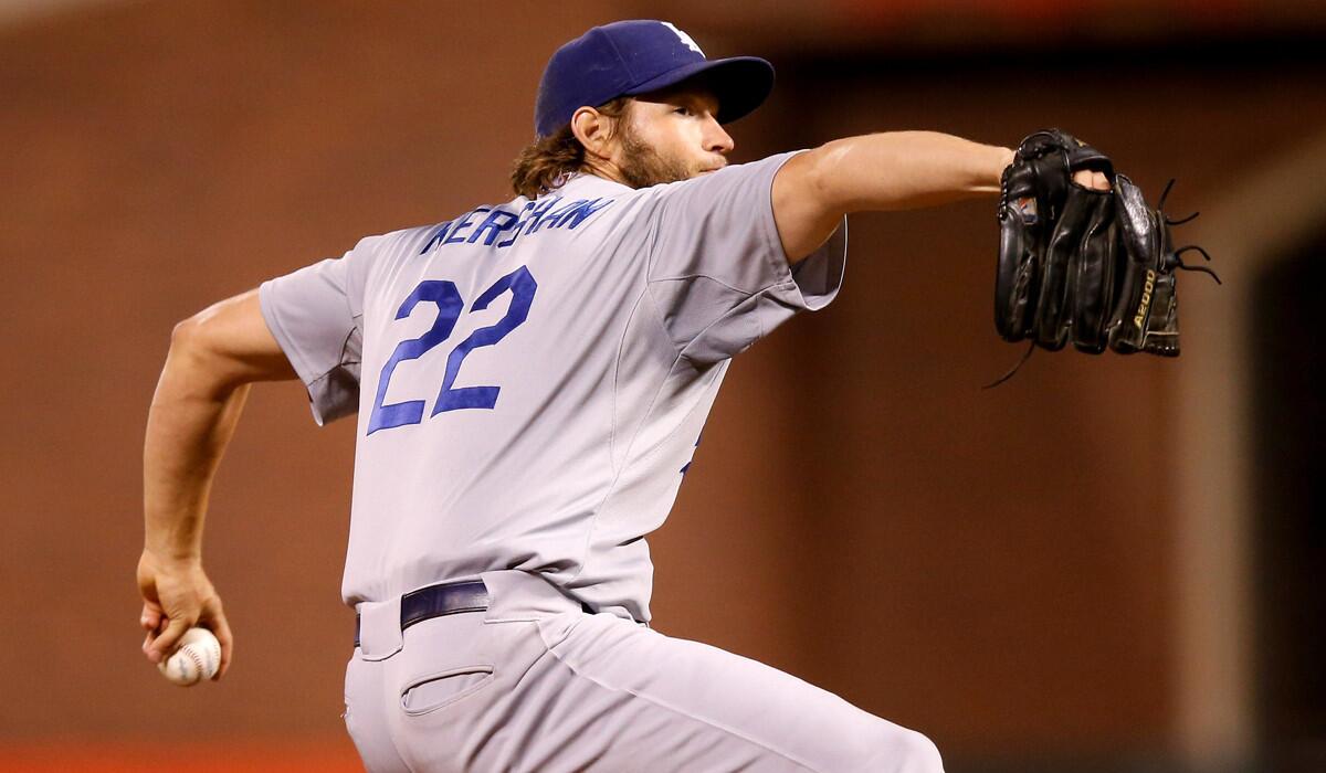 Dodgers' Clayton Kershaw pitches against the San Francisco Giants in the seventh inning on Tuesday.