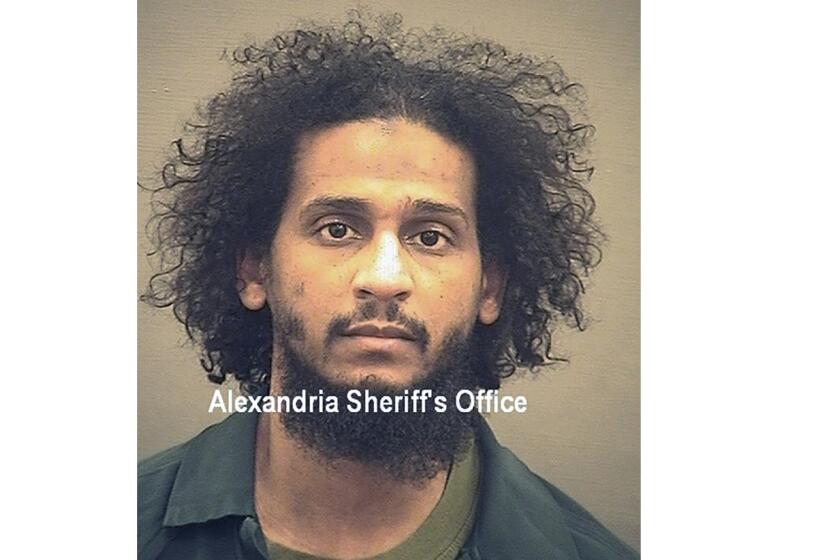 FILE - In this photo provided by the Alexandria Sheriff's Office is El Shafee Elsheikh who is in custody at the Alexandria Adult Detention Center, Wednesday, Oct. 7, 2020, in Alexandria, Va. Elsheikh is charged with hostage-taking resulting in death and other crimes, in what prosecutors say was a conspiracy that resulted in the capture of roughly two dozen Westerners between 2012 and 2015. It was during that time period that the terrorist group controlled large swaths of Iraq and Syria and was at the height of its power. (Alexandria Sheriff's Office via AP)