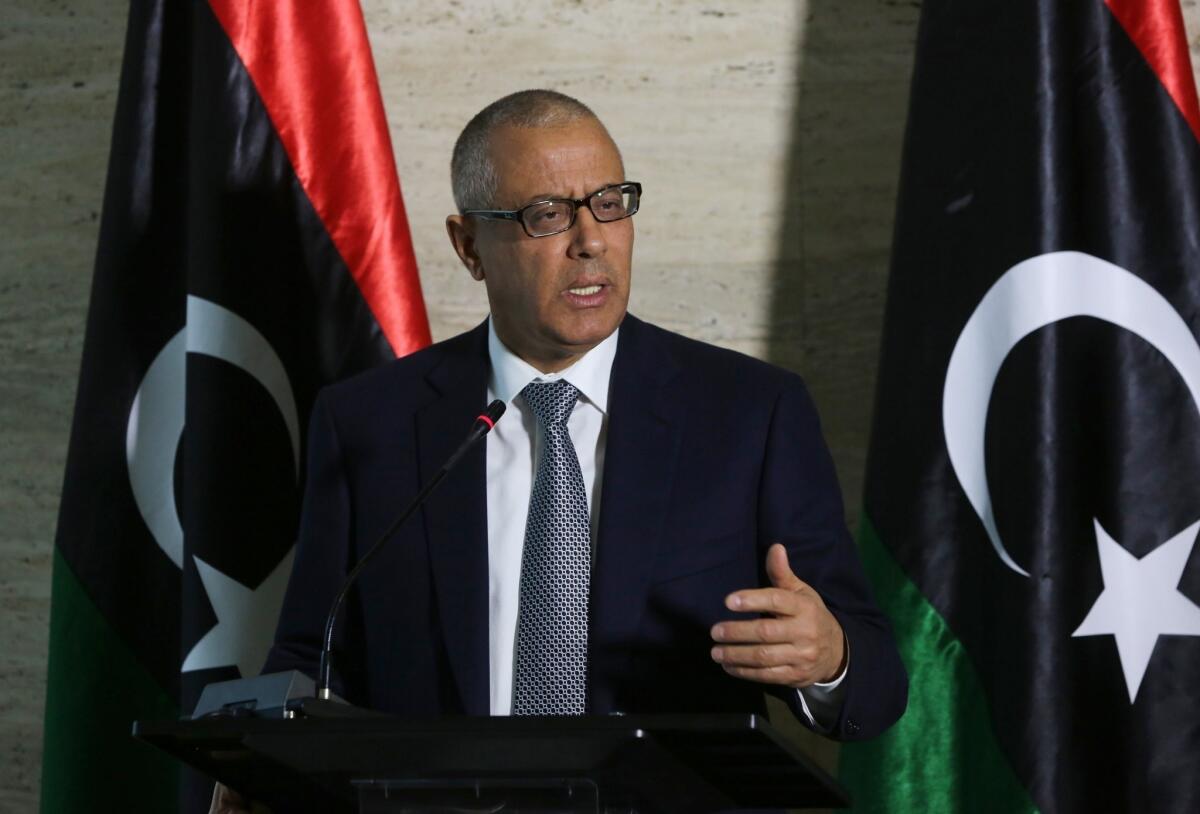 Libyan Prime Minister Ali Zeidan speaks during a news conference in Tripoli. He was ousted Tuesday in a vote of no confidence.