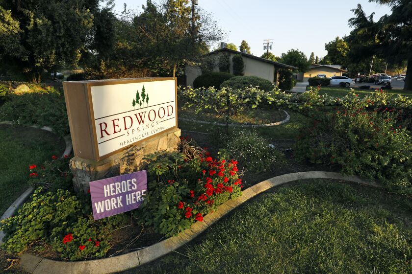 VISALIA, CALIFORNIA-APRIL 23, 2020- At least 16 people have died, 116 patients and 60 staff members hav contracted the coronavirus, Covid-19 at the Redwood Springs Health Center in Visalia. Tulare County demands action after coronavirus outbreak kills 15 at one nursing home.(Carolyn Cole/Los Angeles Times)