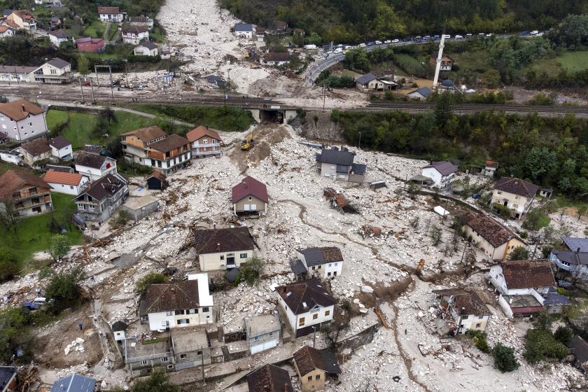 An aerial view shows the area destroyed by a landslide in Donja Jablanica, Bosnia, Saturday, Oct. 5, 2024. (AP Photo/Armin Durgut)