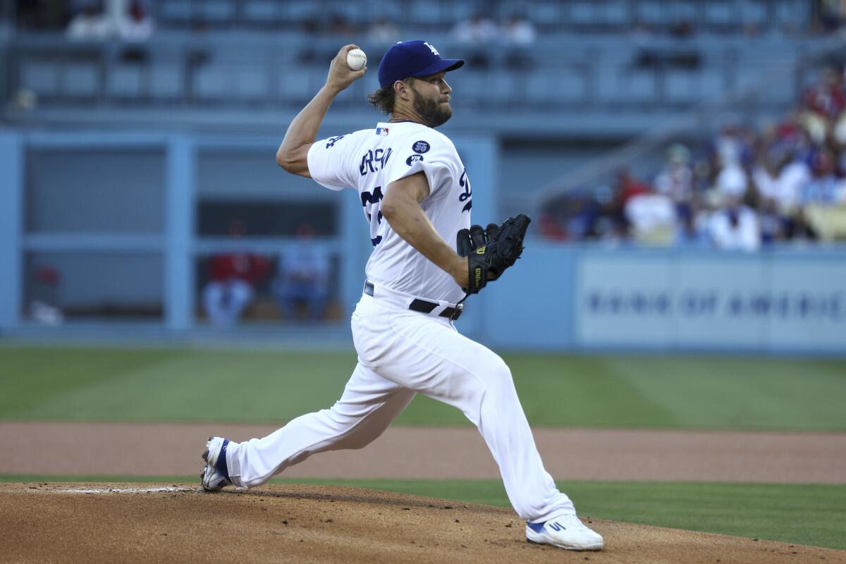 Dodgers starting pitcher Clayton Kershaw delivers during the first inning.