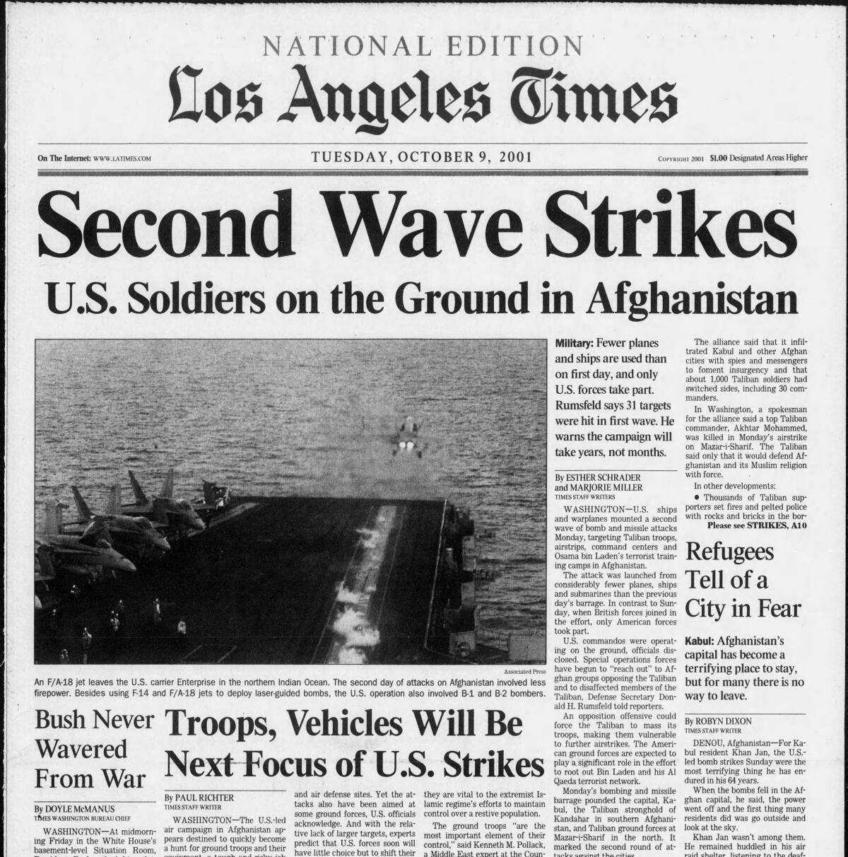 A newspaper headline reads "Second wave strikes; U.S. soldiers on the ground in Afghanistan."