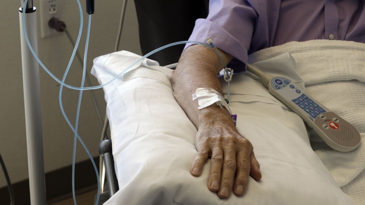 A cancer patient receives chemotherapy treatment.