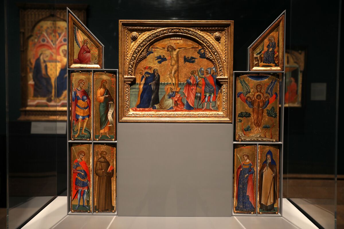 A reconstructed Paolo Veneziano altarpiece that includes the Annunciation and Crucifixion, as well as images of saints.