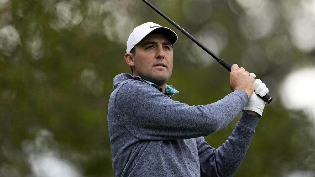 Scottie Scheffler watches his tee shot on No. 4 during the third round of the Masters on April 9, 2022.