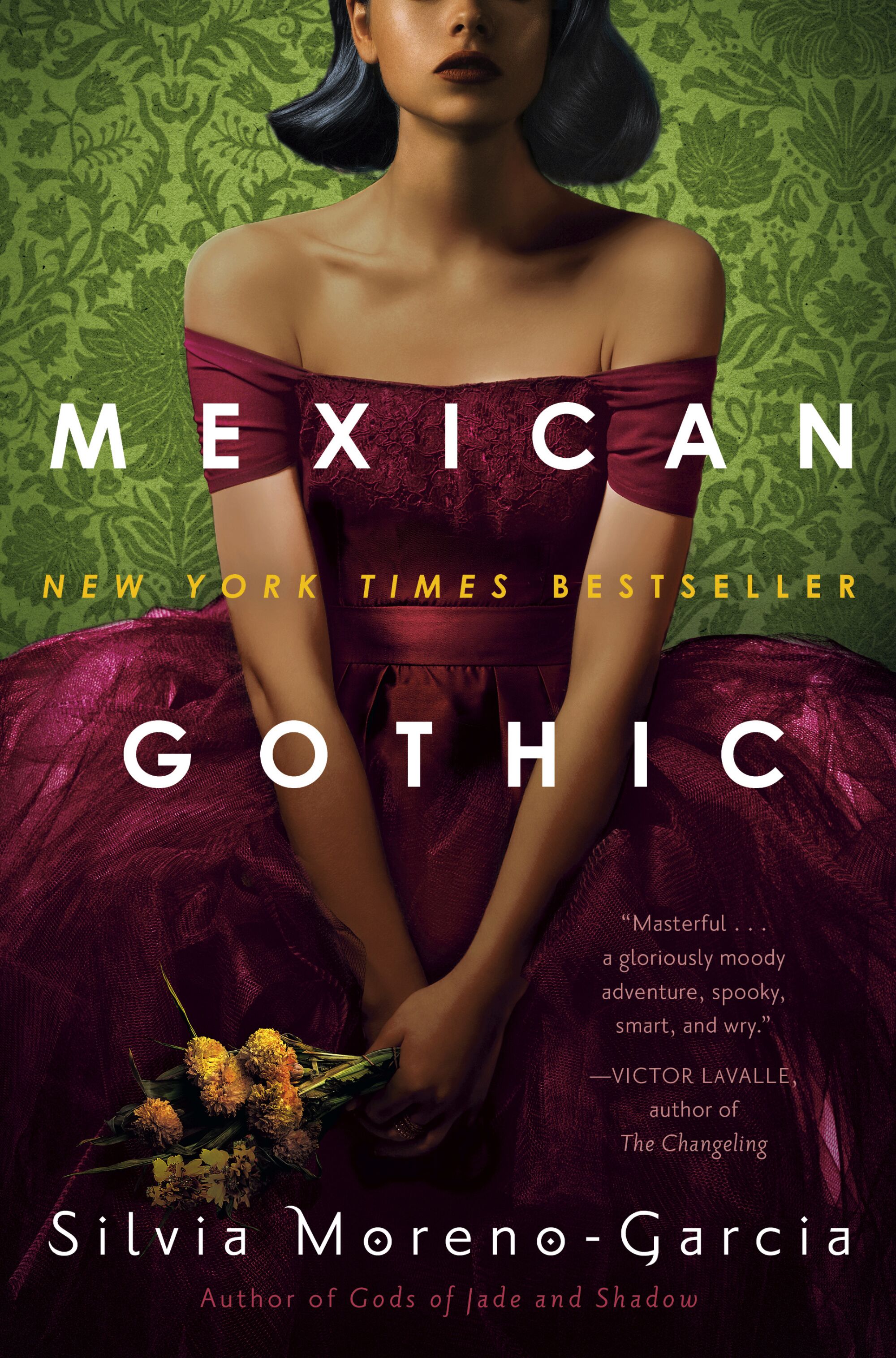 Book cover with woman in a gown holding flowers
