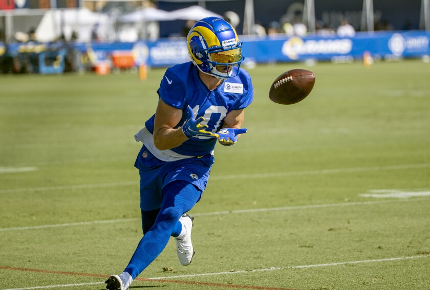 Rams wide receiver Cooper Kupp pulls in a pass during training camp practice.
