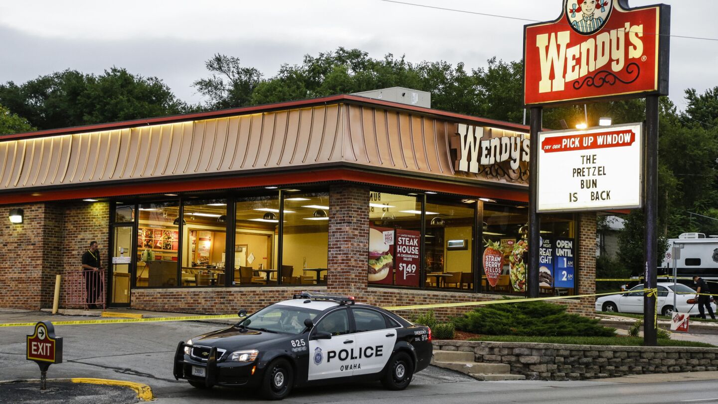 A crew member for the TV show "Cops" was fatally shot when Omaha officers responded to an armed robbery at a Wendy's restaurant on Tuesday night. The robber was also killed.