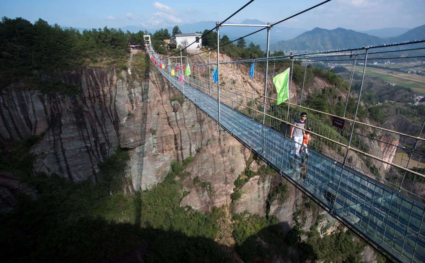Glass walkway over canyon in China