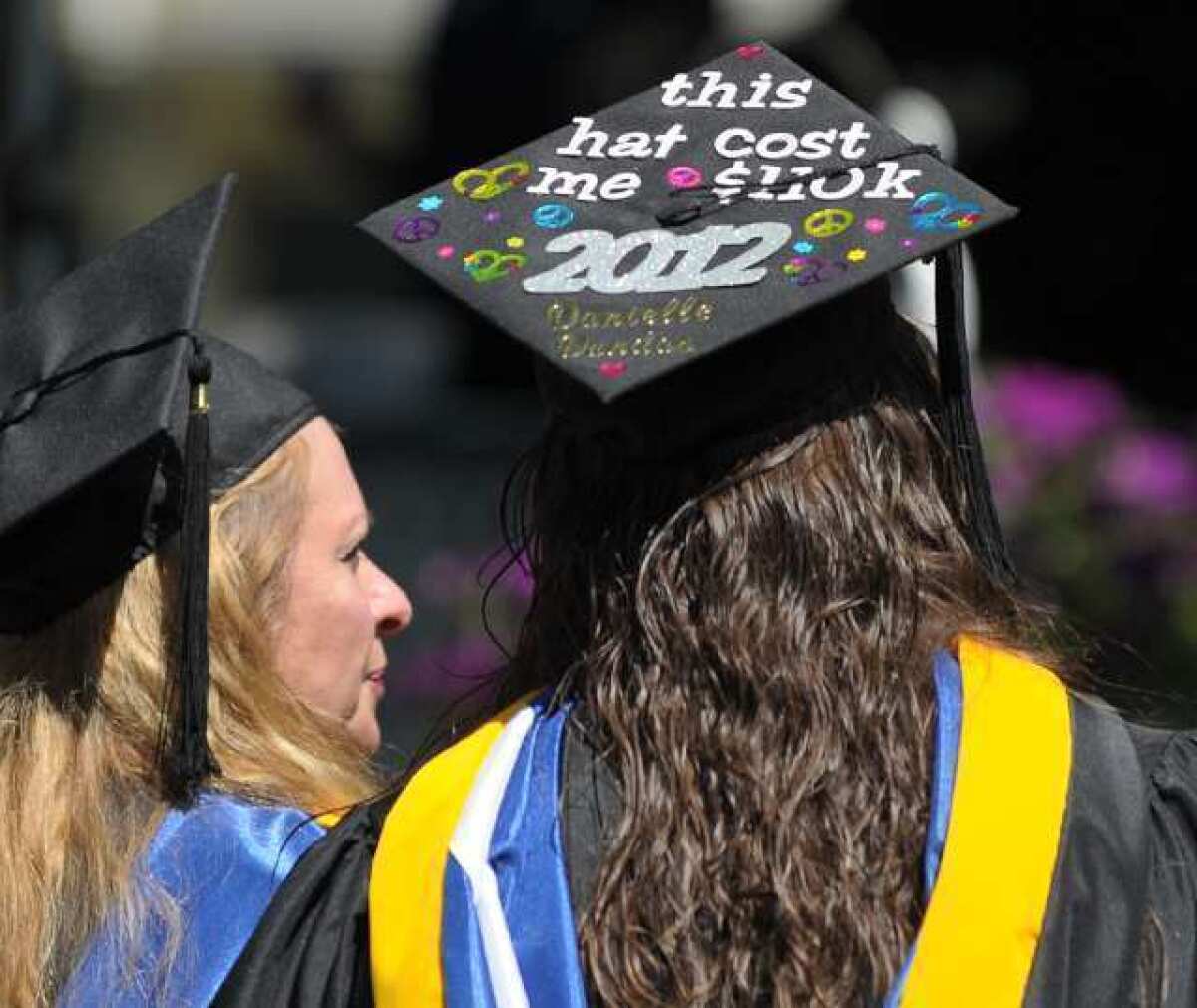 This graduation cap -- photographed during the Centenary College commencement ceremony -- helps explain why assets are rising in 529 college plans.