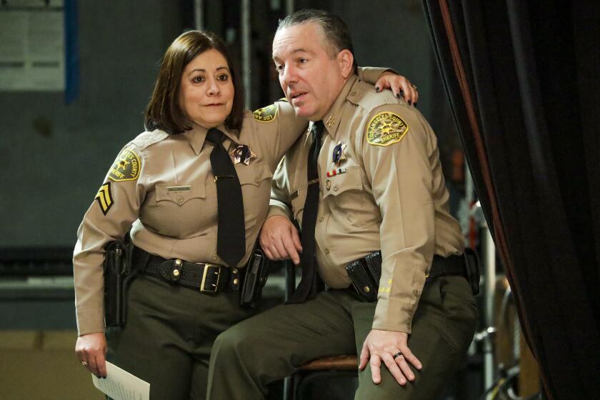 Los Angeles County Sheriff Alex Villanueva, right, and his wife Vivian at LASD Recruits graduation ceremony on Nov. 8, 2019