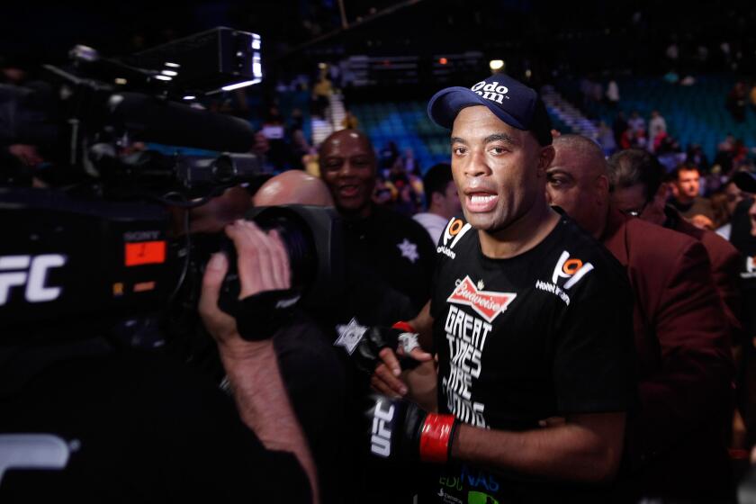 Anderson Silva exits Las Vegas' MGM Grand Garden Arena after a successful comeback against Nick Diaz at UFC 183 on Jan. 31.