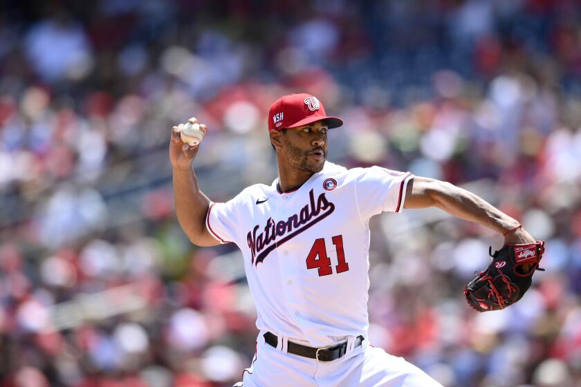 The Washington Nationals' Joe Ross delivers a pitch against the Dodgers on July 4, 2021, in Washington.