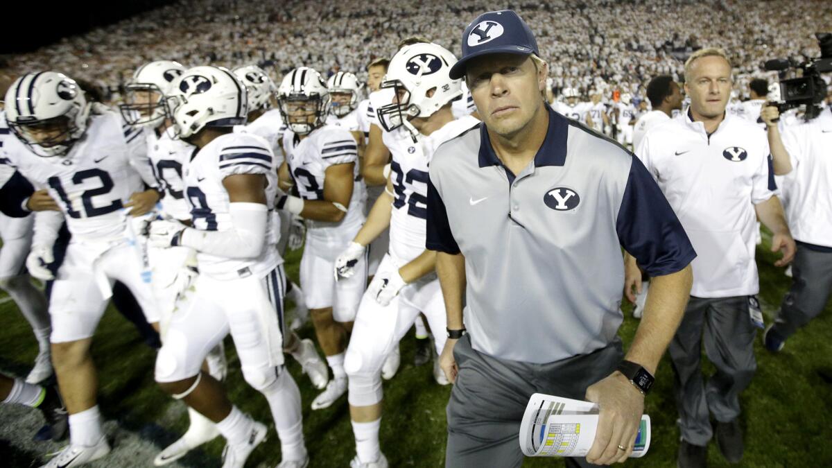 Coach Bronco Mendenhall and his Brigham Young football team defeated Boise State, 35-24, last week in Idaho.