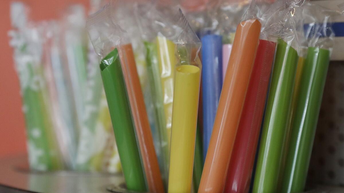 Plastic straws are wrapped for individual use at a tea cafe in San Francisco.