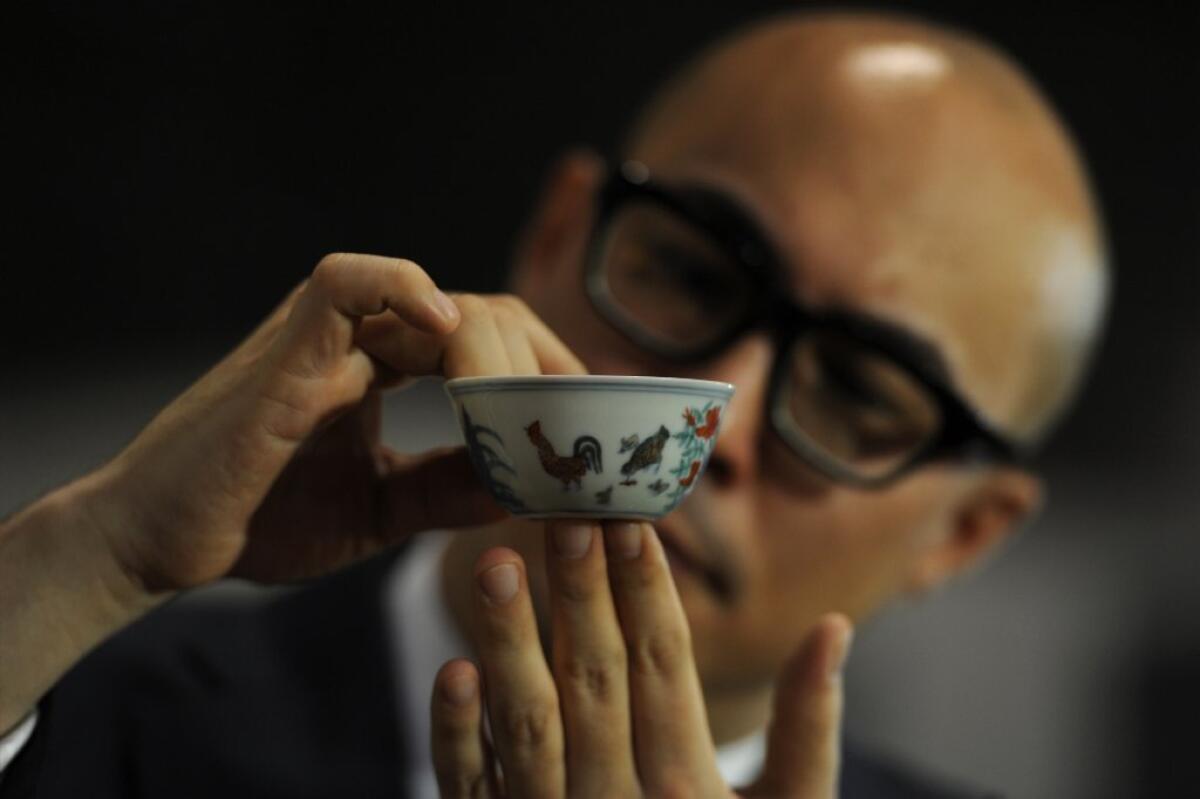 A rare, 15th century Chinese cup broke the world auction record for any Chinese porcelain, selling in Hong Kong for $36 million.
