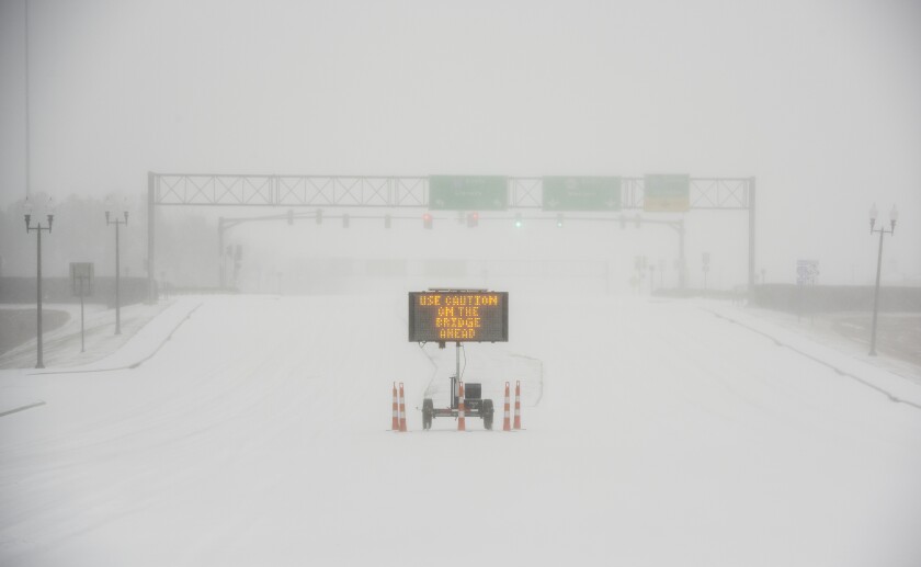 A warning sign during a snowstorm in Mississippi