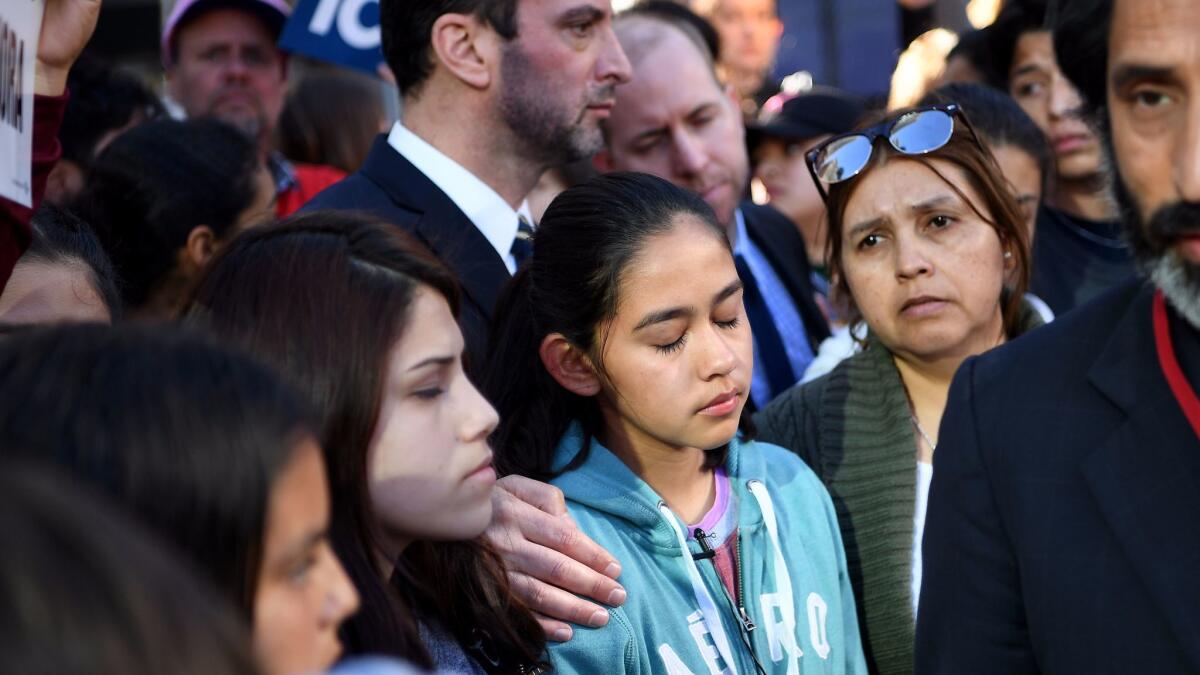 Fatima Avelica, 12, cries during a press conference and rally in downtown Los Angeles after she filmed her father being detained by ICE officials in late February.