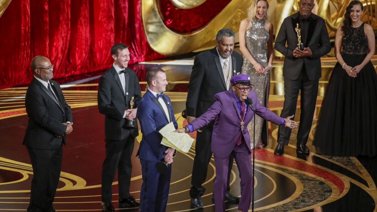 Spike Lee accepts the adapted screenplay award for "BlacKkKlansman" during the 91st Academy Awards on Sunday.