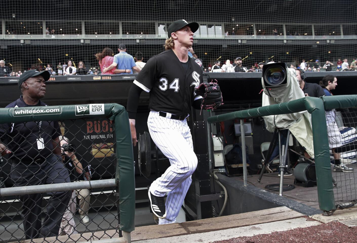White Sox starting pitcher Michael Kopech, heads to the bullpen for warmups before his MLB debut at Guaranteed Rate Field on Aug. 21, 2018.