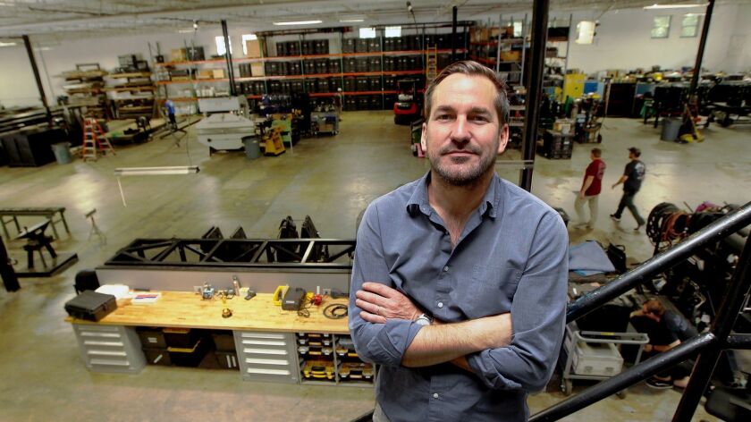 James (J.D.) Schwalm at his special effects warehouse in Atlanta, Georgia. Schwalm moved his company, Innovation Workshop, to Atlanta several years ago but is troubled by Georgia's new abortion law and calls by Hollywood to boycott the state.