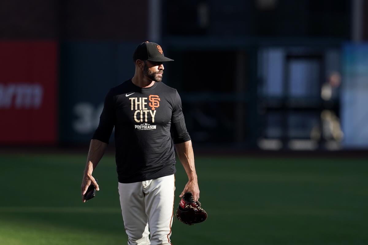San Francisco Giants manager Gabe Kapler watches players during a team practice on Wednesday.