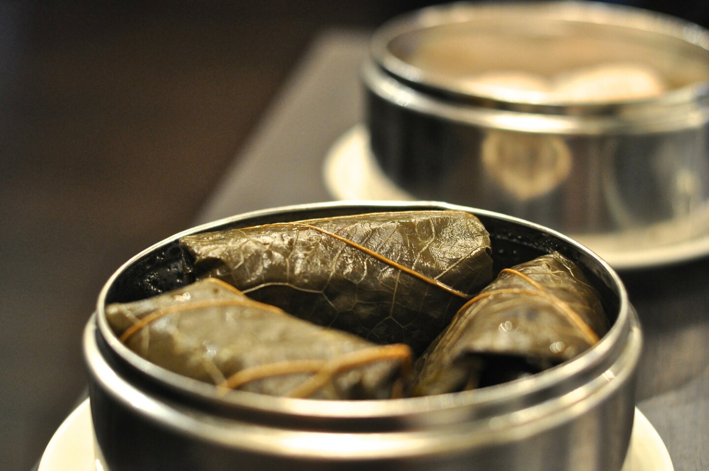 Bamboo-wrapped sticky rice at the new Lunasia in Pasadena is among the many dim sum options.
