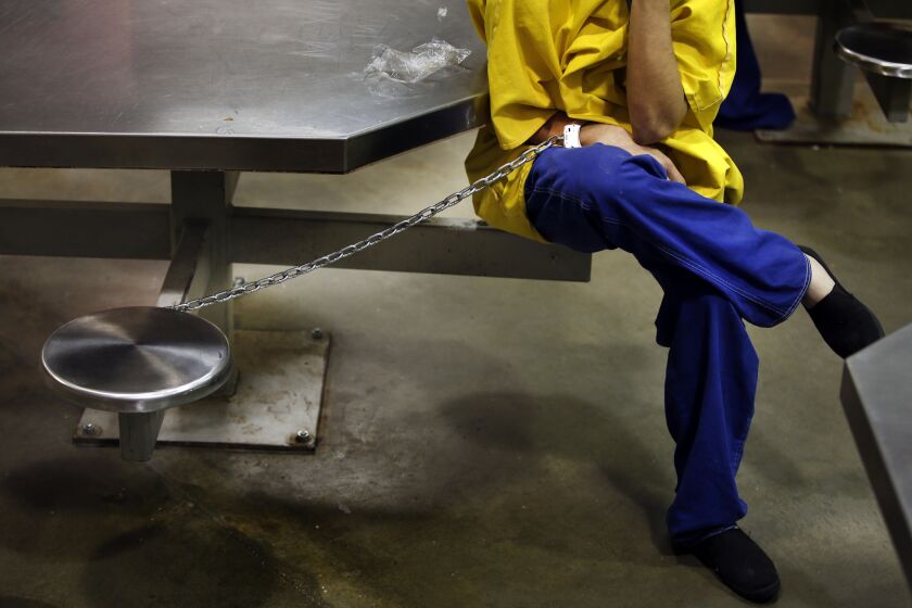 Sometimes inmates are chained to tables for security reasons in the High Observation Mental Health Housing unit at the Twin Towers Correctional Facility in Los Angeles. Officials in the jail are trying to correct issues in the facility that can lead to extreme depression and suicide.