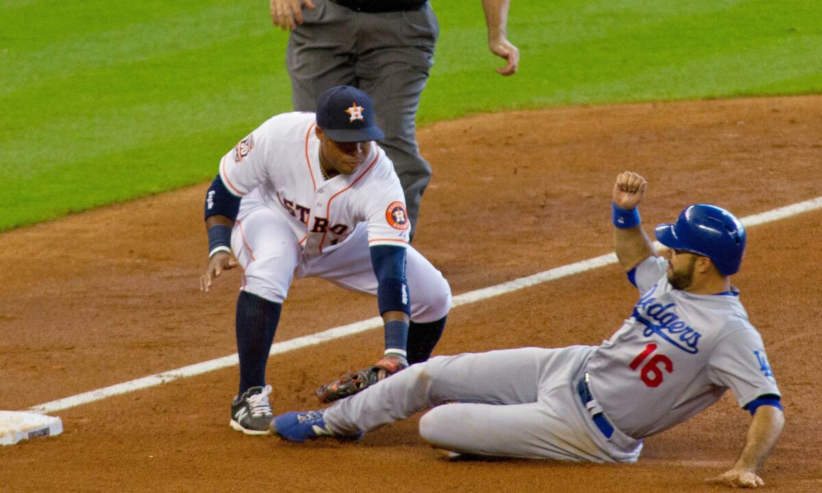 Outfielder Andre Ethier, seen here caught stealing against the Astros, and the Dodgers hope to be able to break out of their offensive funk.