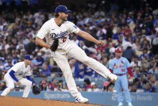 Los Angeles Dodgers starting pitcher Clayton Kershaw throws to the plate during the fifth inning.