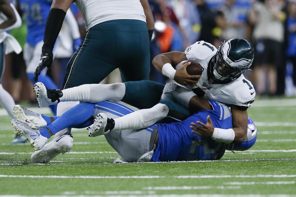 Lions' Walker ejected after swiping at Eagles, hitting Hurts - The San  Diego Union-Tribune