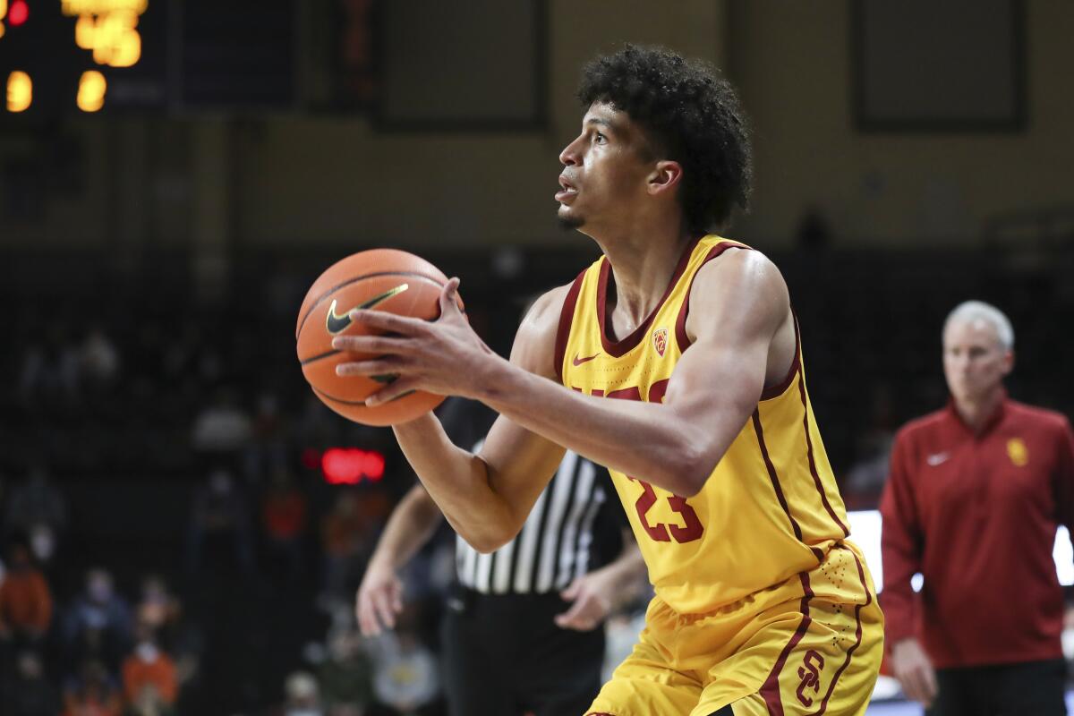 USC forward Max Agbonkpolo shoots against Oregon State on Thursday.