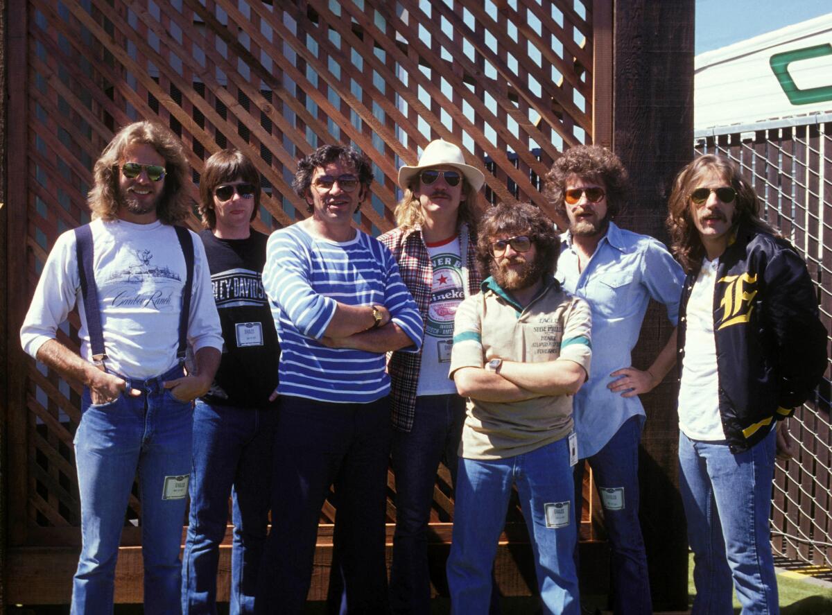 Don Felder, Randy Meisner, Bill Graham, Joe Walsh, Irving Azoff, Don Henley and Glenn Frey